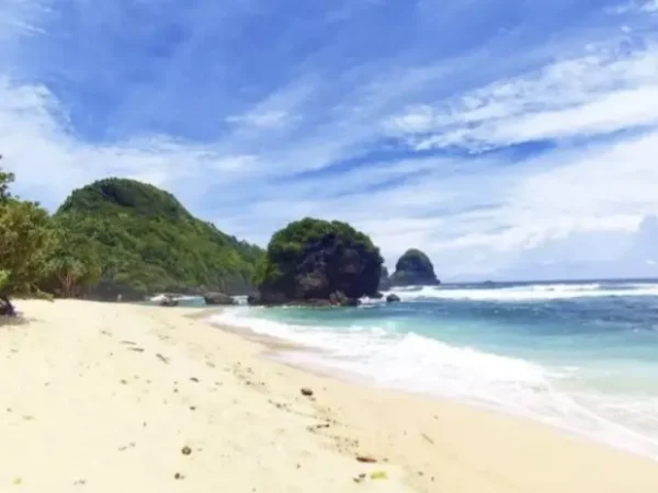 Watu Leter Beach, White Sand Beach with Exotic Coral Rocks in Malang